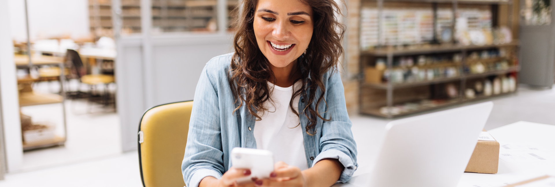 Woman Business Owner Checking Messages 1920X650