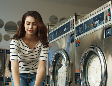Self Service Laundry Woman 3 Washers 600X600